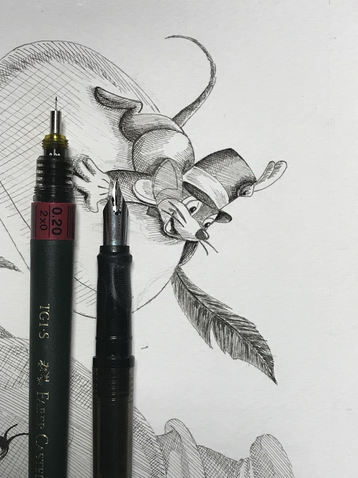 Close-up drawing with pens resting on the paper